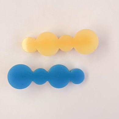 Gele en blauwe druppelvorminge haarclips voor meisjes